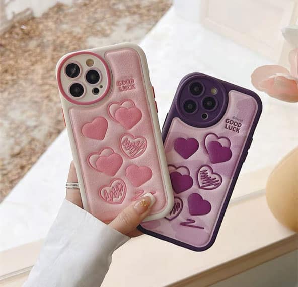 قاب چرمی پافری انواع گوشی موبایل اپل در دو رنگ جذاب بنفش و صورتی با طرح قلب